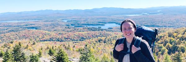 Photo: Carolyn Koestner Carolyn Koestner on a hike with river valley in background